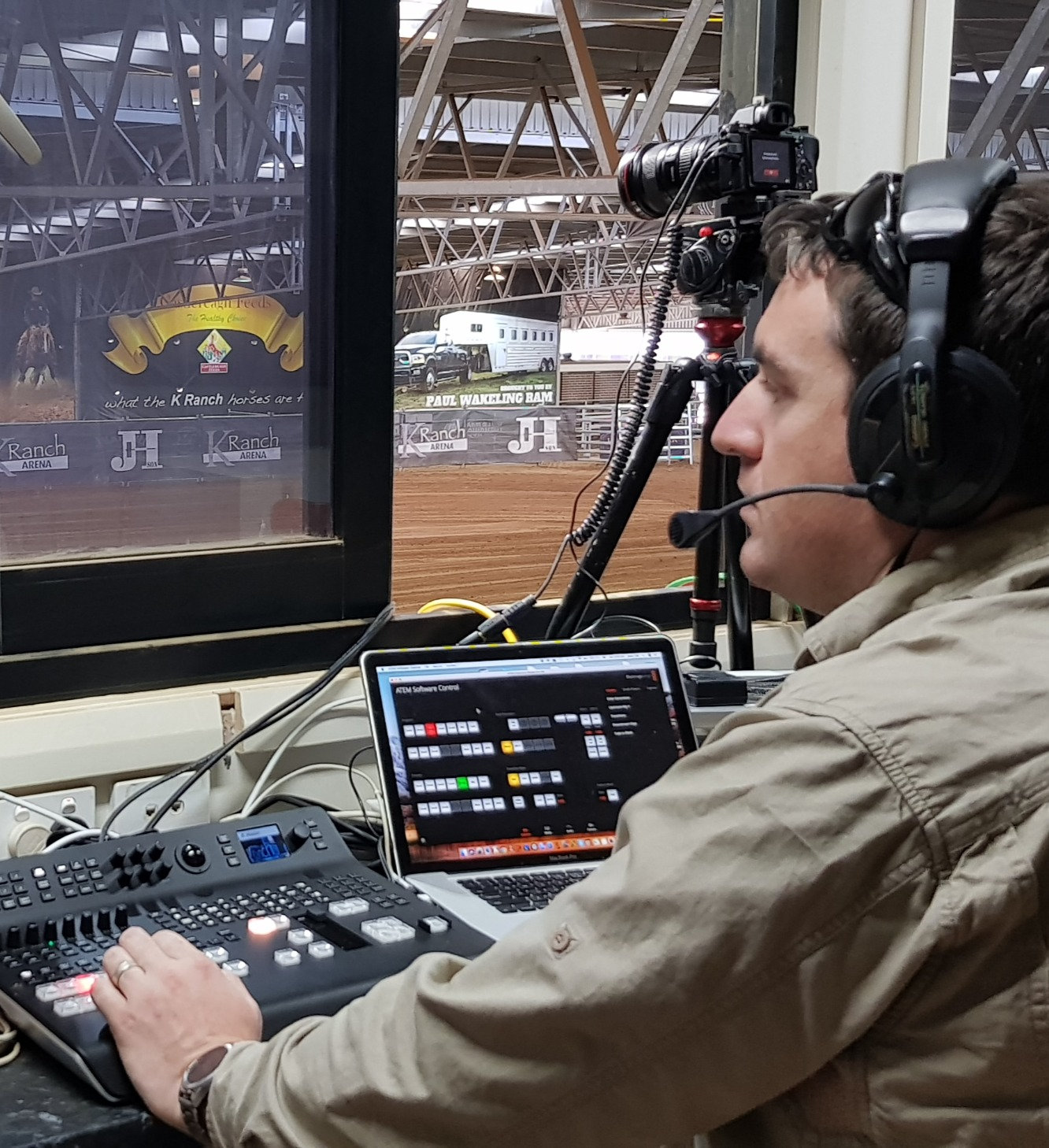 Evan directing a live broadcast from the switcher inside a stadium