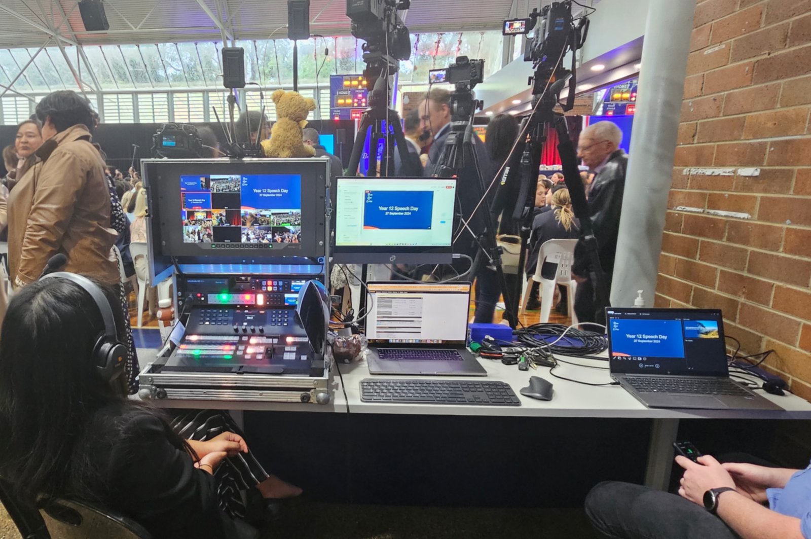 A live production position with vision mixer, multiview and cameras at an event