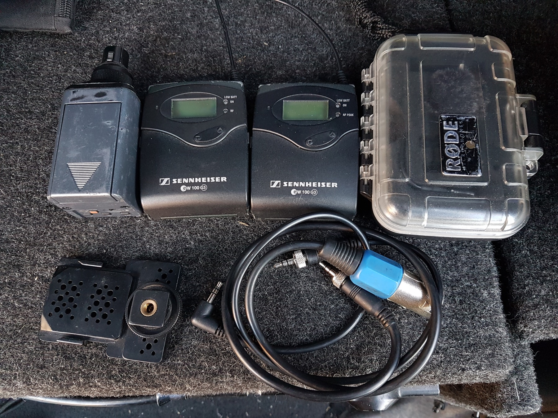 Sennheiser wireless transmitter and receiver with a Rode lapel case